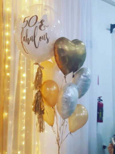 Helium birthday balloon bouquet delivery in Playa del Carmen